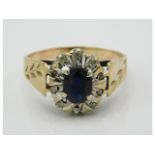 A 9ct gold ring set with sapphire & small diamonds, 2.7g, size N