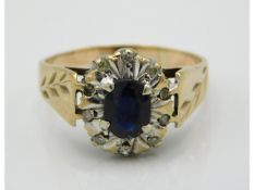 A 9ct gold ring set with sapphire & small diamonds, 2.7g, size N