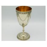 A Victorian 1865 London silver wine goblet by Samuel Smith & Son. Ltd. with gilded bowl, 7in tall x