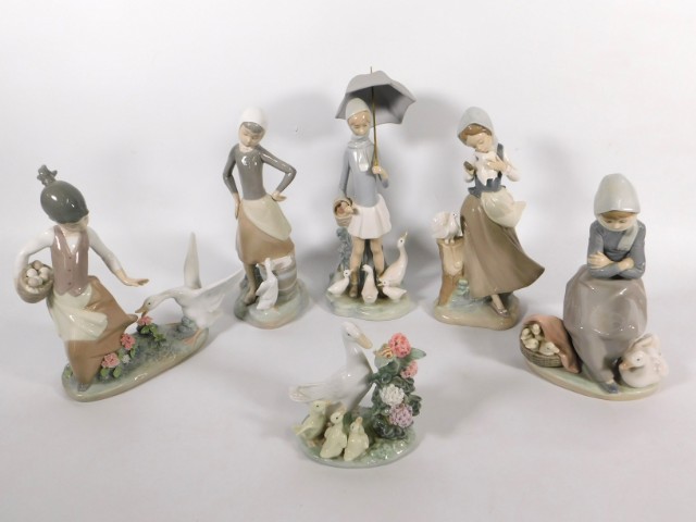 Five Lladro porcelain figures of figures with geese twinned with small geese group, unboxed, tallest