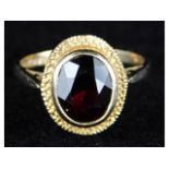 An early 1970s 9ct gold Georgian style ring set with garnet, 2.7g, size M