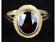 An early 1970s 9ct gold Georgian style ring set with garnet, 2.7g, size M