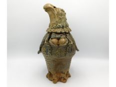 A large Jennie Hale studio pottery jar & cover modelled as a bird of prey, 12.25in tall