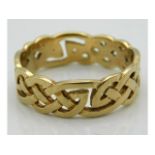 A 9ct gold band of Celtic style knot form, size T/U, 4.4g