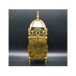 A 1920/30s French brass lantern clock, 12in tall x 4.5in wide x 4.25in deep