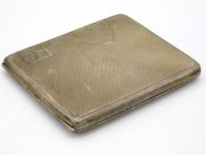 A 1925 Birmingham silver cigarette case with machined decor by Martin Hall & Co. Ltd. monogrammed to