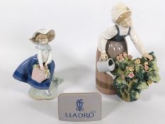 Two Lladro figures, one of lady watering flowers, some faults to flowers, twinned with Lladro porcel