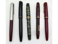 Five fountain pens, four with 14ct gold nibs including Parker Duofold, Parker Junior & two Conway St