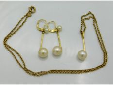 A 19.5in long 9ct gold chain, 3.7g with gold mounted pearl pendant & gold mounted pearl drop earring