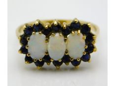 A 9ct gold opal & sapphire ring, 2.4g, size N/O