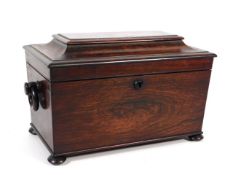 A 19thC. rosewood tea caddy with wooden handles, measuring 15in wide x 7.5in deep x 8.75in high