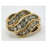 A 9ct gold diamond ring set with approx. 1ct diamonds, 5.6g, size M