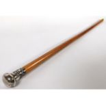 A Malacca cane with Chinese dragon topped white metal handle, 36in long