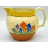 A Clarice Cliff Bizarre crocus design jug, 7.875in wide x 5.75in high, hairline to rim near handle