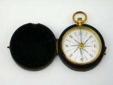 A pocket sized brass compass, face diameter 42mm