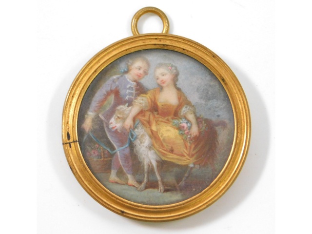 A French 18thC. miniature group of girl, boy & goat set in gilt frame. Image size 40mm diameter. Ivo