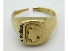 A 19thC. gold centurion signet ring, originally set with small rose cut sapphires, worn. damaged, lo