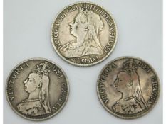A Victorian 1894 silver crown twinned with two half crowns, 1887 & 1890 respectively, 74.2g