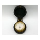 A pocket sized R & J Becks of 51 Cornhill, London cased brass Farmers barometer, no.590