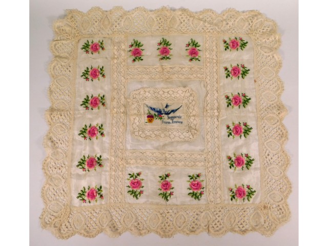 A WW1 sweetheart embroidered lace & silk work from "Souvenir from France", 23.5in x 22.5in