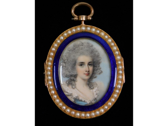 George Engleheart (1750-1829), a miniature portrait of a lady wearing powdered hair & a light blue d