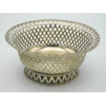 A 1912 London silver fretwork bonbon basket by Lambert & Co. 132mm diameter x 60mm high, 122.7g