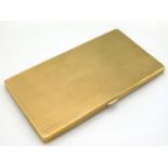 A 9ct gold cigarette case with machined decor, made by B. H. Britton, assayed in Birmingham 1921, 15