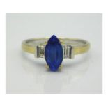 An 18ct gold marquise cut tanzanite & diamond ring, some light abrasions to centre stone, 3.2g, size