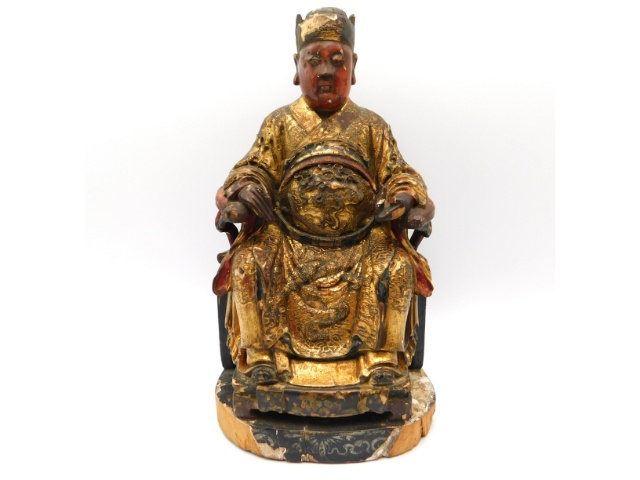 A Chinese gilt lacquered wood figure of an immortal, 9.5in tall