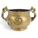 A 19thC. Chinese bronze censer with bat decor for handles, six character mark to base, 9in wide x 5.