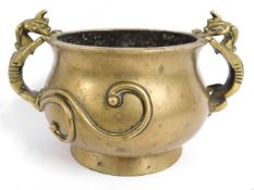 A 19thC. Chinese bronze censer with bat decor for handles, six character mark to base, 9in wide x 5.