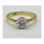 An 18ct gold ring with Tiffany style mounted diamond of approx. 1.1ct, very small inclusion near edg
