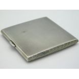 A 1924 Birmingham silver cigarette case with machined decor by Deakin & Francis, 118.3g