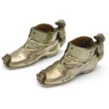 A pair of c.1900 silver plated novelty pin cushions with puppy & kitten with large boot