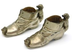 A pair of c.1900 silver plated novelty pin cushions with puppy & kitten with large boot