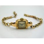 A Giroxa 18ct gold cased ladies watch with a 9ct gold strap, 14.2g