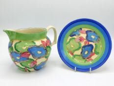 A Clarice Cliff Bizzare blue chintz design jug & plate, jug 6.75in wide x 5in high, jug has small, v