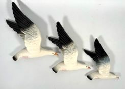 A set of three graduated Beswick seagull wall plaques, 922-1, 922-2 & 922-3, largest measuring 14in