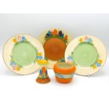 A Clarice Cliff Bizarre crocus design plate, 7in diameter, twinned with pepper pot & marmalade jar,