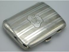 A 1922 Birmingham silver cigarette case by Joseph Gloster Ltd. monogrammed, 79.9g