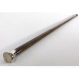 A 1992 Birmingham silver topped walking cane with chased floral pattern decor, 35.75in long