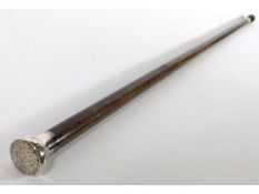 A 1992 Birmingham silver topped walking cane with chased floral pattern decor, 35.75in long