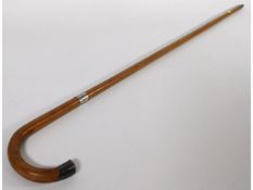 A traditional walking cane with 1923 Kendall & Sons London silver tip & collar, 36in long