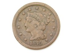 An 1845 USA one cent, 27.25mm diameter