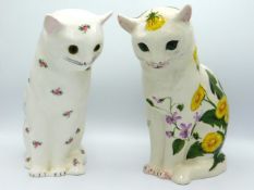 A Wemyss pottery cat with glass eyes, decorated with dandelions & violets, painted to base "Exon 267