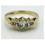 A 9ct gold ring set with topaz & illusion set diamonds, 1.5g, size I/J