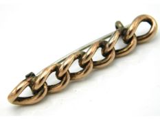 An antique 9ct gold link brooch with steel pin, 40mm wide, boxed, 2g