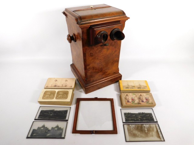 A walnut, table top stereoscope viewer with approx. 164 cards including topographical, portraits, an