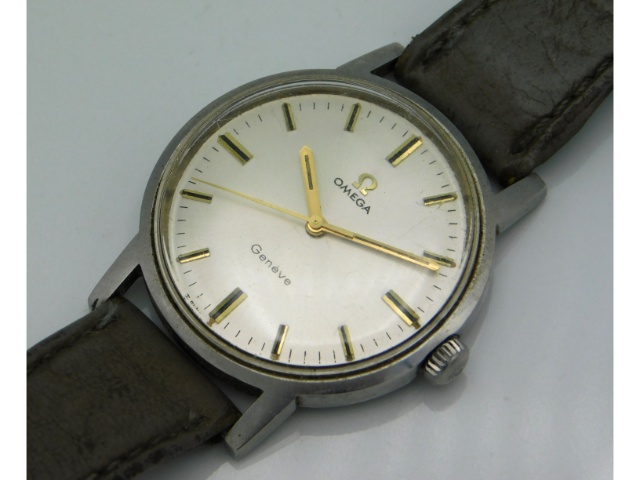 A gent's Omega Geneve wristwatch, currently running, leather strap a/f, case 32mm diameter