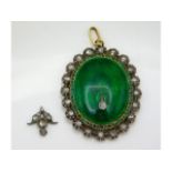 A 19thC. gold & silver guilloche enamelled locket pendant set with diamonds & cabochon cut green sto
